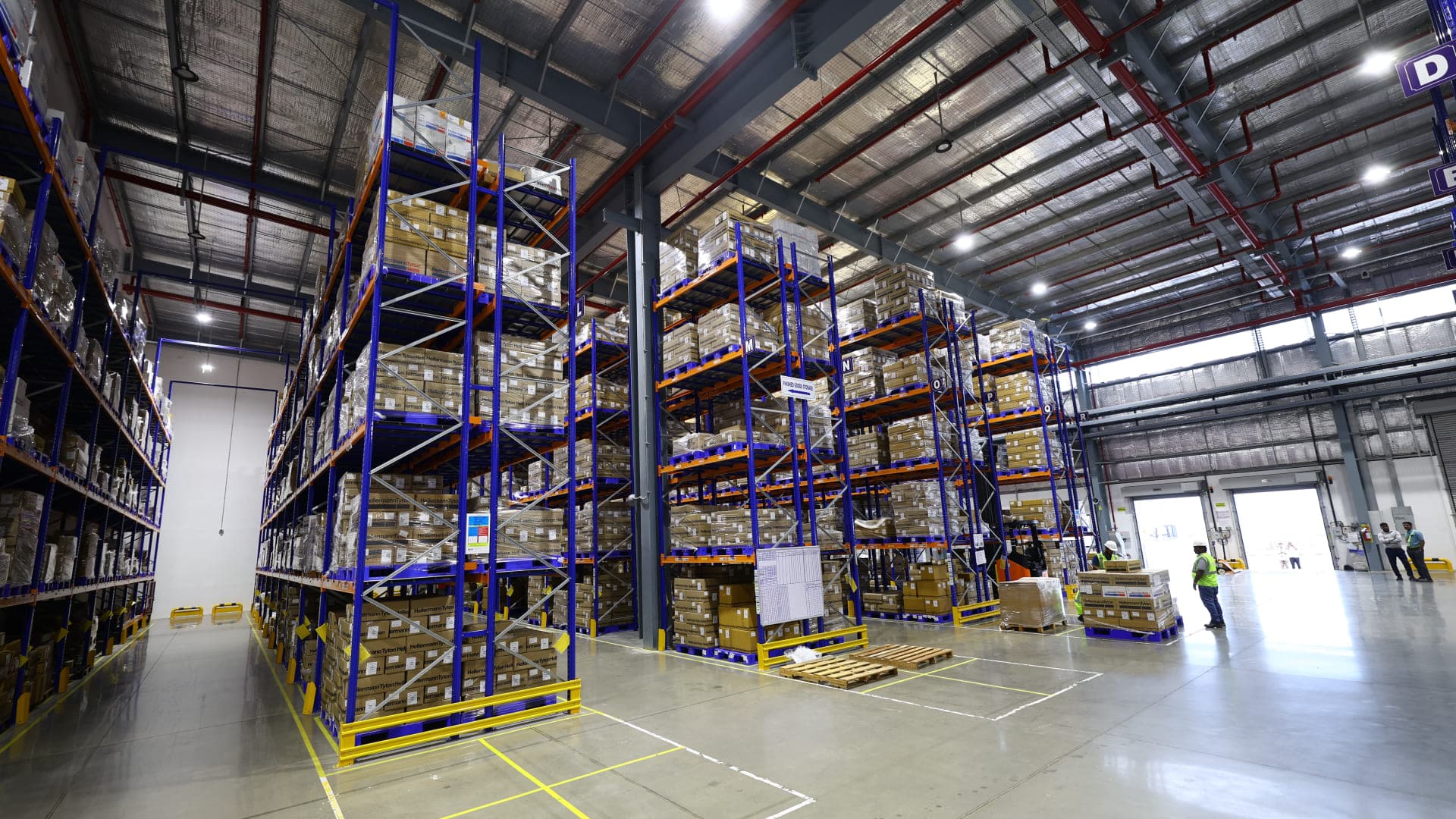 Interior of a future-ready Greenbase industrial warehouse with high-bay storage racks