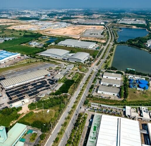 Aerial view of land surrounding an industrial development